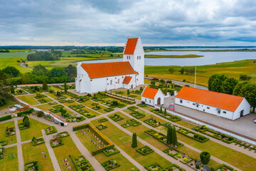 Fanefjord Church in Denmark during a cloudy day