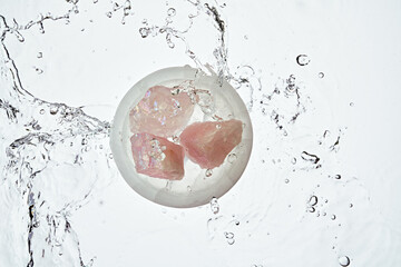 Pink Crystals in quarts bowl with water splash