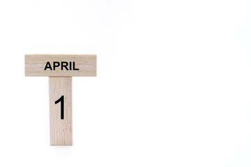 April 8 displayed wooden letter blocks on white background with space for print. Concept for calendar, reminder, date. 