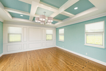 Beautiful Light Blue Custom Master Bedroom Complete with Entire Wainscoting Wall, Fresh Paint, Crown and Base Molding, Hard Wood Floors and Coffered Ceiling