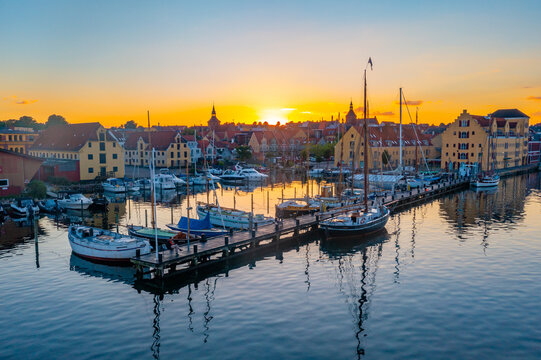Sunset view of old boats at marina in Svendborg, Denmark