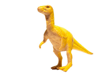 An isolated yellow plastic dryosaurus