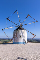 Traditional windmill in the hills of Portugal.