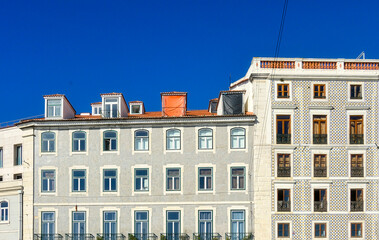 Fototapeta na wymiar Facade of colonial-style buildings in Lisbon, Portugal