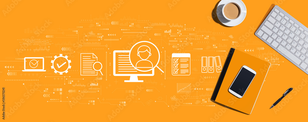 Poster document management system concept with a computer keyboard and office items