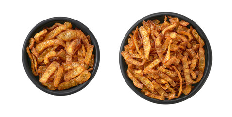 Crispy fried shallots on black bowl, isolated on white background, top view. clipping path.