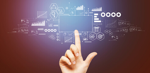 Business theme with hand pressing a button on a technology screen