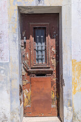 Peeling paint on an old door in Evora.