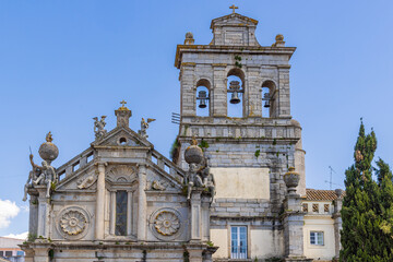 Fototapeta na wymiar The bell tower of Grace Church in Evora.