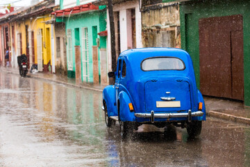 Fototapeta na wymiar Classic Car In The Rain