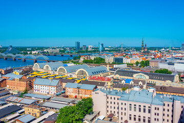Aerial view of Riga including the Latvian national library and the zeppelin hangars from top of the academy of sciences building. © dudlajzov