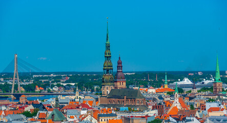 Aerial view of the old town of riga including saint peters church and the cathedral.