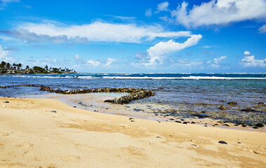 Hawaiian Fish Pond made from lava rock close to shore