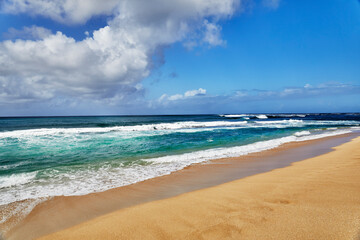 Fototapeta na wymiar Shore Break waves on a Tropical Beach