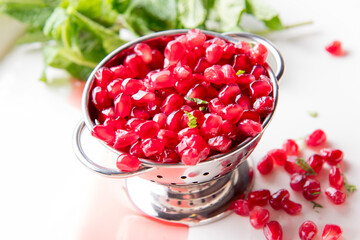 A colander of fresh Pomeranian with Mint