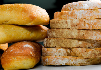 Close up of fresh italian bread sliced and whole