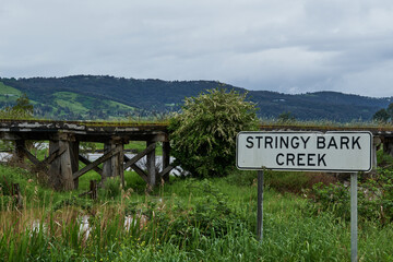 Fototapeta na wymiar Stringy Bark Creek, Victoria In Massive Flood, Across Pasture and Farmland