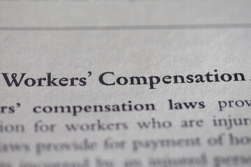 workers compensation printed in text on page as visual aid or business law reference