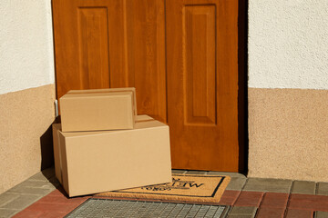 Parcels delivered on mat near front door