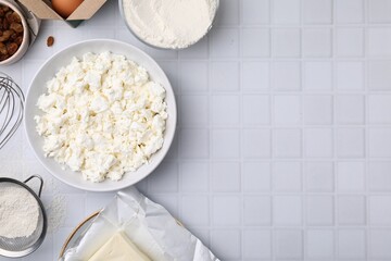 Different ingredients on white tiled table, flat lay and space for text. Cooking cottage cheese pancakes