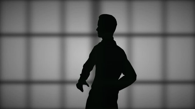 Man silhouette looking over his shoulder