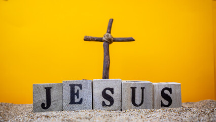 wooden cross with the inscription Jesus