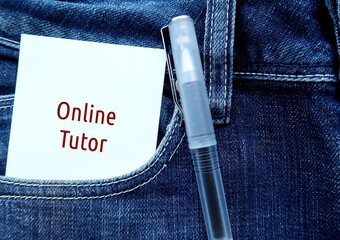 pen in jean pocket with handwritten text note ONLINE TUTOR, tutor who provide tutoring to students...