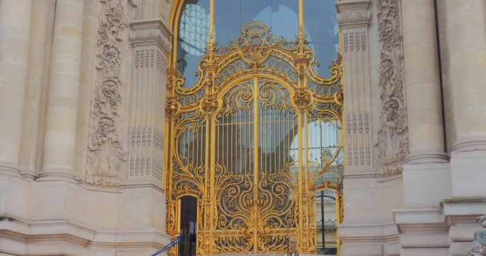 Antique Golden Gate Of The Petit Palais In Paris, France. Low Angle Shot