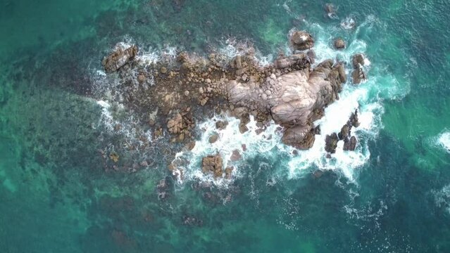 drone footage panoramic view of huatulco oaxaca mexico summer travel destination tropical beach sea cliffs in the sea and waves