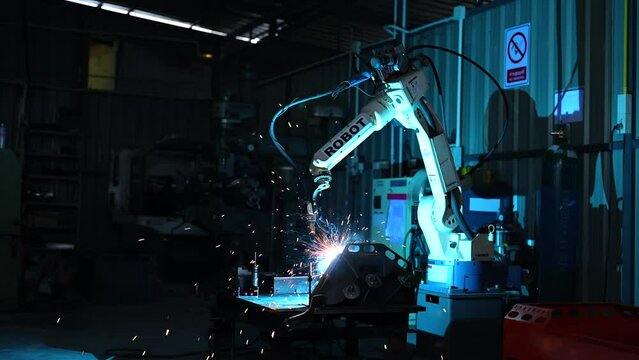 welding robots represent the movement in the automotive parts industry