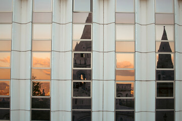 Fishermen's bastion reflected in the mirror windows of a building, Budapest, Hungary