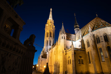 St. Matthias Church in Budapest illuminated at night.
