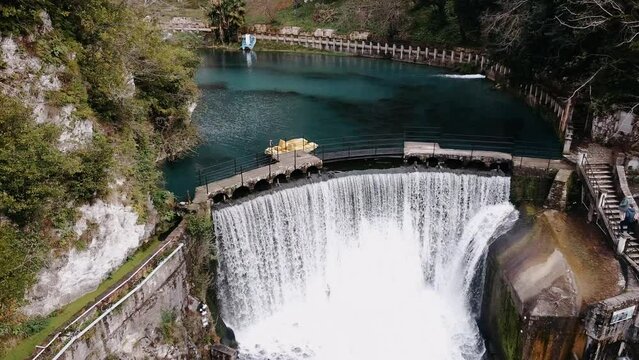 Drone flight over the existing hydroelectric power station. This power plant was built in the city of New Athos in Abkhazia, the construction of a hydroelectric power station in the early 20th century