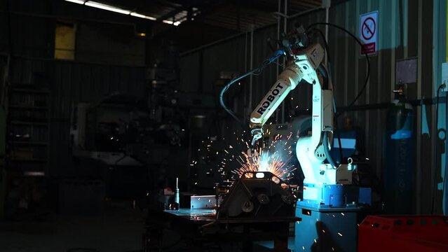 welding robots represent the movement in the automotive parts industry