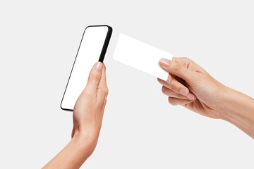 Woman Paying with a credit card in a terminal that is a mobile phone, NFC wireless payments, Contactless	
