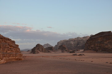 Fototapeta na wymiar Beautiful Wadi Rum landscapes from the desert in Jordan with its pink and orange rock formations