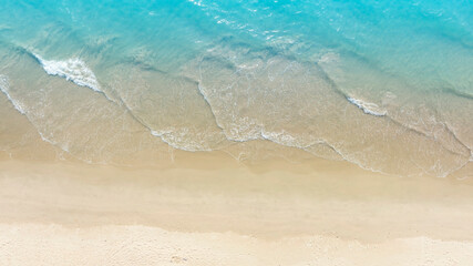 Aerial view with beach in wave of turquoise sea water shot, Top view of beautiful white sand...
