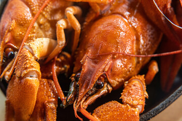 River boiled crayfish. Red cooked crayfish. Plate with crayfish.