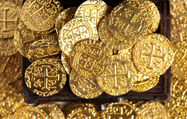 Treasure Chest Filled with Golden Coins on a White Background