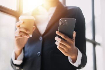 Financial analysts analyze business financial reports on a digital tablet planning investment project during a discussion at a meeting of corporate showing the results of their successful teamwork.