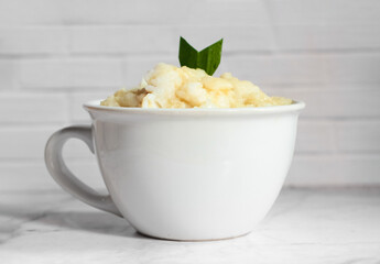 Bubur sumsum. Dessert porridge originating from Java made from rice flour, coconut milk with palm sugar syrup. Popular food during Ramadan. Bubur sumsum is a traditional food from Java