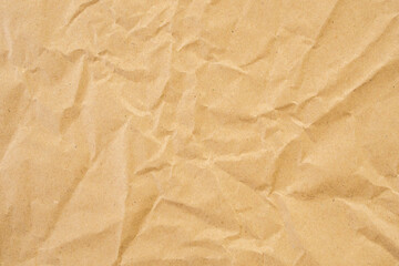 Abstract brown crumpled creased recycle paper texture background