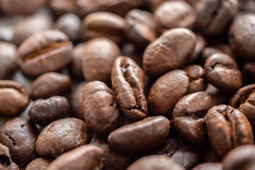 Fresh roasted brown coffee beans background