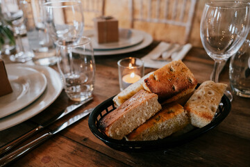 Bread basket set on dinner table