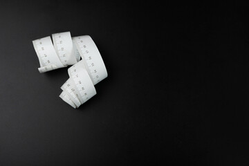 Measure Tapes Isolated, Metric Tape on Black Background