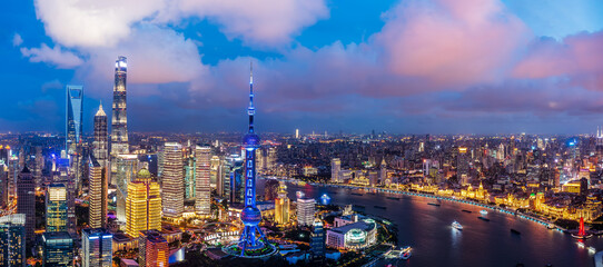 Aerial view of Shanghai skyline and modern buildings at night, China. Panoramic view.