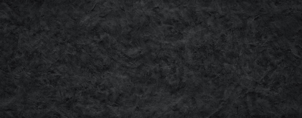 aesthetic black plaster or stucco panoramic background © PsychoBeard