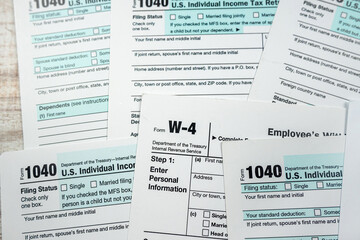 closeup of 1040 US personal income tax form on desk
