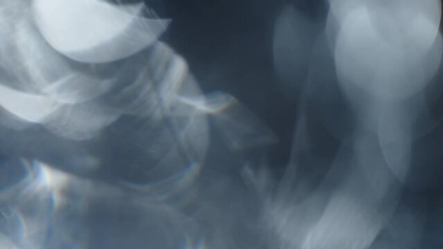Blue Bokeh Crystal Particles in Motion
