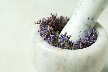 Skin care cosmetic, making of lavender oil in mortar